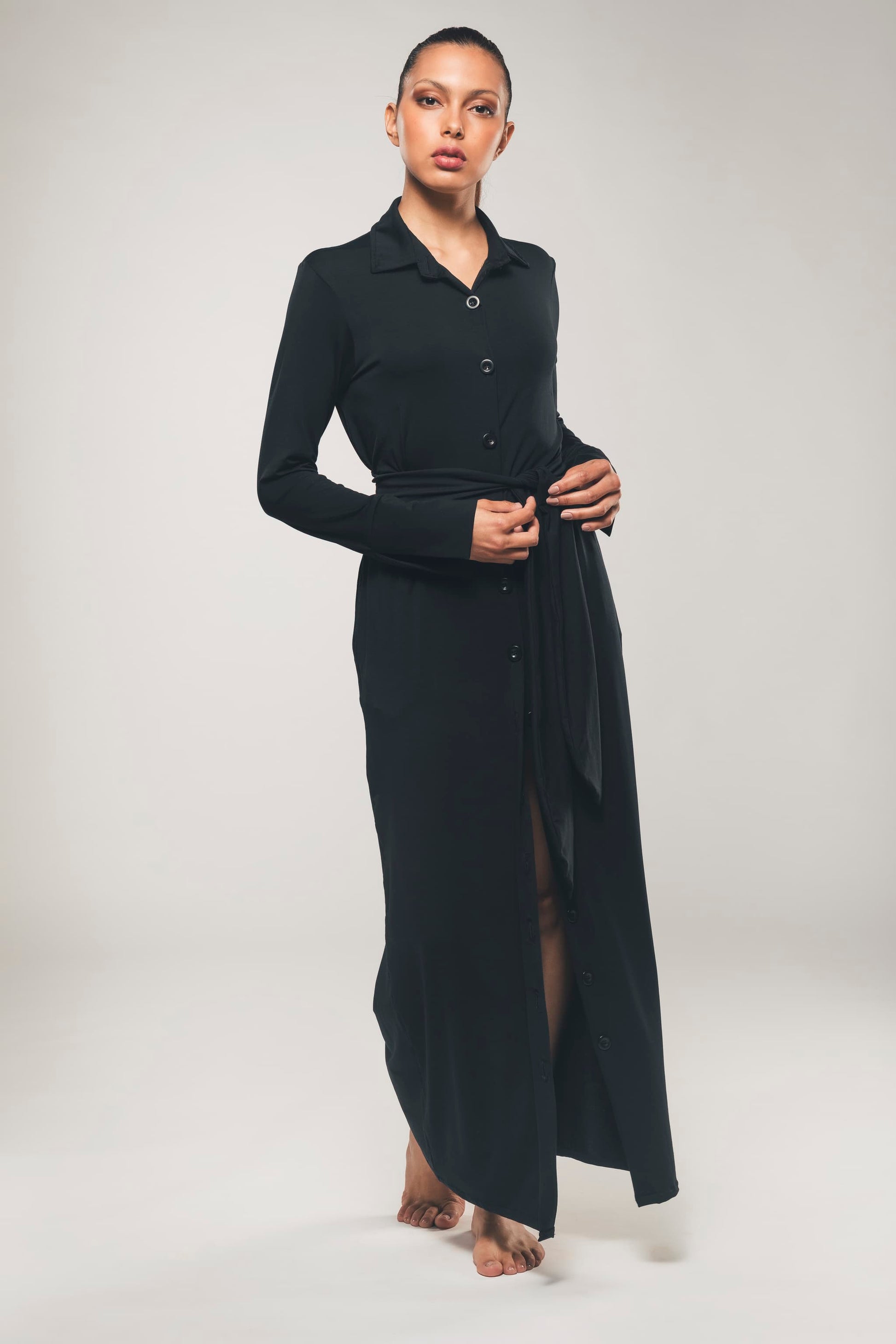 Image of organic lyocell maxi shirt dress in black made by Organique. 